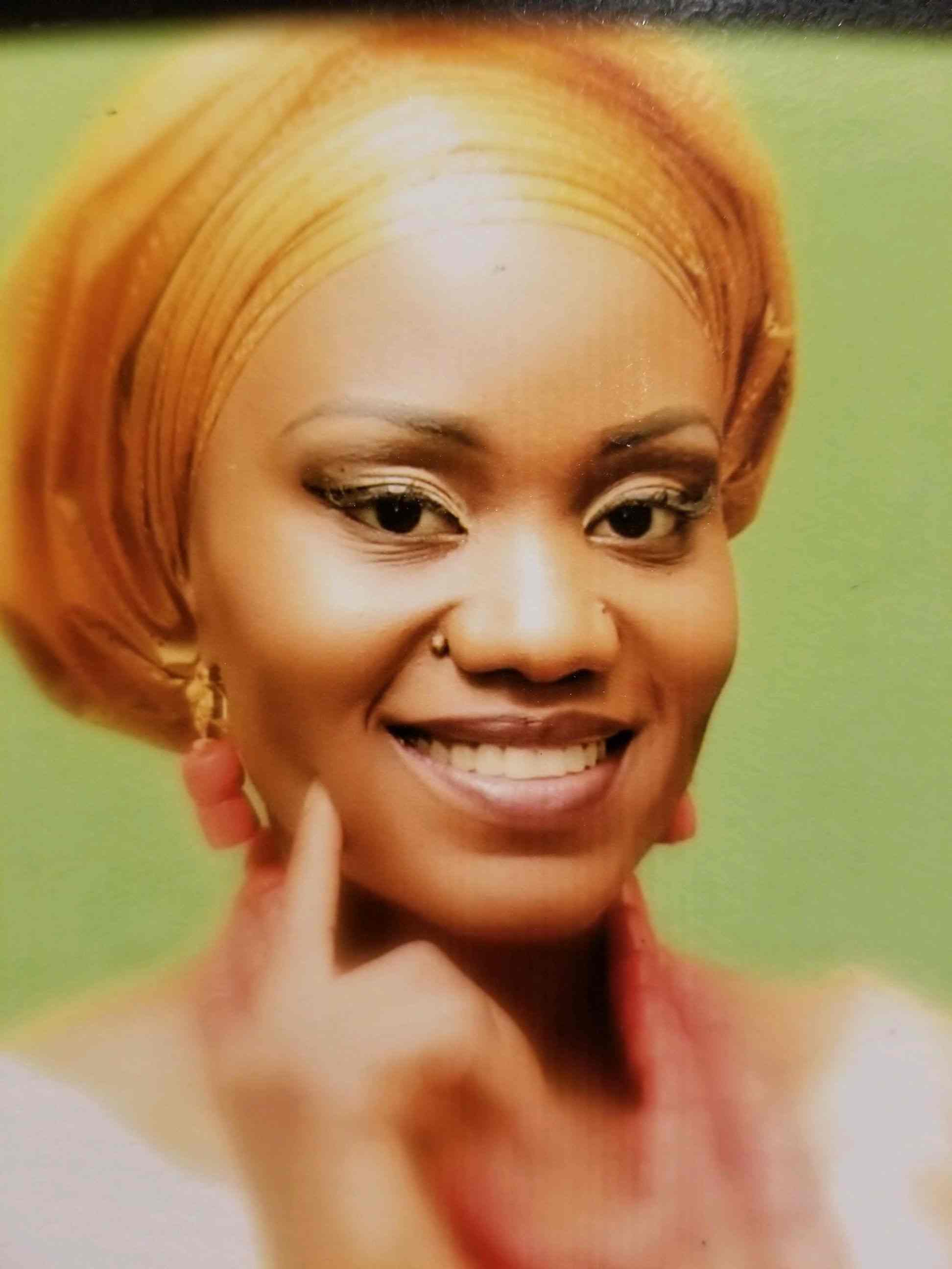 Picture of a smiling African woman. 